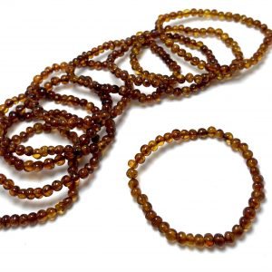 Konjako spalvos baroko formos gintaro apyrankė,Coganc amber baroque beads stretch bracelet