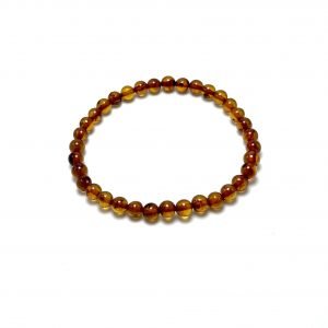 Konjako spalvos gintaro rutuliukų apyrankė 5 mm Coganc amber round beads stretch bracelet 5 mm