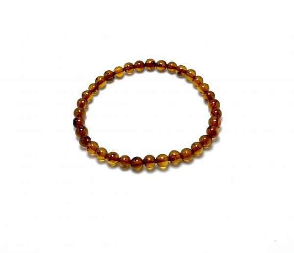 Konjako spalvos gintaro rutuliukų apyrankė 5 mm Coganc amber round beads stretch bracelet 5 mm