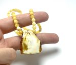 Geltono gintaro rutuliukų vėrinys su baltu pakabuku, yellow amber beads necklace with white pendant