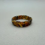 Medaus spalvos Baltijos gintaro apyrankė „Šypsenėlė” su natūraliomis fosilijomis, Honey color Baltic amber bracelet "Smiley" with natural fossil