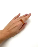 Masažinis gintaro žiedas medaus spalva, Amber massage ring in honey color.
