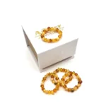 Masažinis gintaro žiedas baroko formos šviesi spalva, Massage amber ring baroque shape light-colored