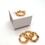 Masažinis gintaro žiedas baroko formos šviesi spalva, Massage amber ring baroque shape light-colored