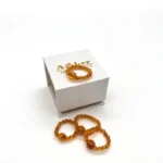 Masažinis gintaro žiedas medaus spalva, Amber massage ring in honey color.