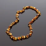 Baltijos gintaro karoliai - įvairiaspalviai kamantai, 50cm, Baltic amber necklace - multicolored chips, 50cm