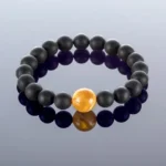 Round black amber bracelet, 9x12mm